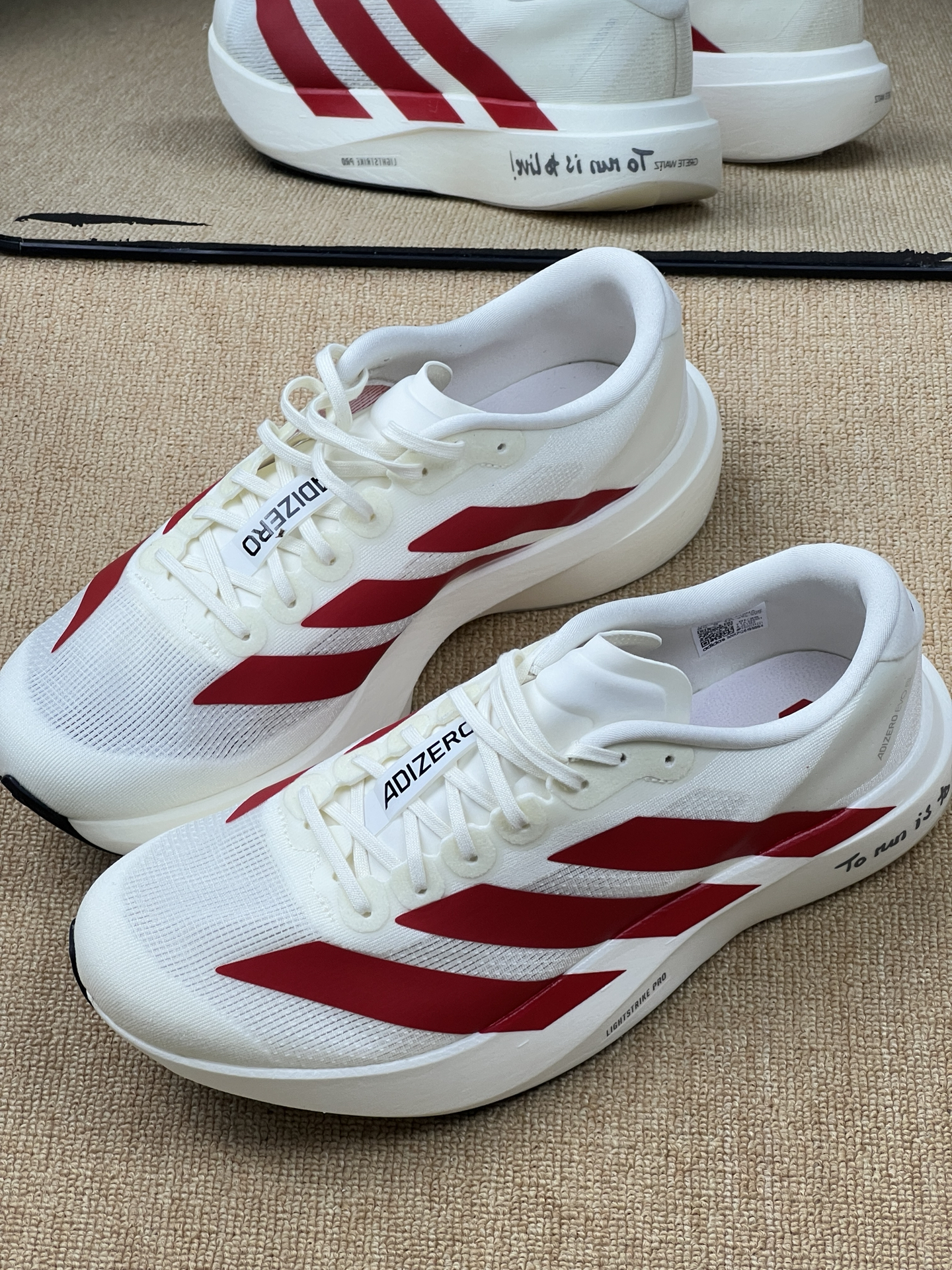 아디다스 아디제로 EVO SL 오프 화이트 베러 스칼렛 JS1182 photo review